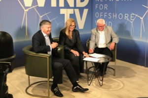 (left to right) Allen Leatt, IMCA’s CEO, signs the MOU with Lori Rugh the Network’s Senior Vice President for Collaboration & Communications in the Wind TV studio while Bruce Gresham, IMCA Director of Client Engagement in the U.S. looks on IMCA signs MOU with Business Network Offshore Wind